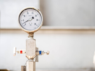 Pressure gauge of measuring instrument close up in industry zone at power plant