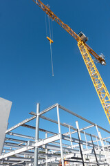 Structural steel and crane on multistory constructions site