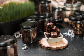 Homemade Brownies served on black table at cafe​