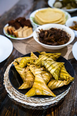 Ketupat palas with all traditional Malay Food and cookies during Ramadan and Eid Mubarak. Hari Raya Aidilfitri.
