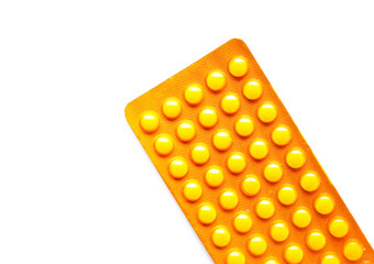 Blister pack with pills on white background