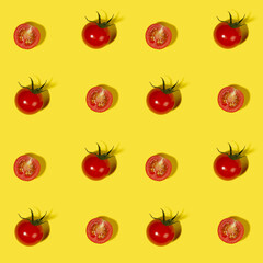 Vegetable colorful seamless pattern - ripe cherry tomato whole and halves with shadow on yellow background top view, square.