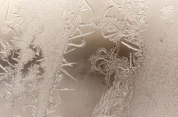 Patterns from frost on glass as a background.