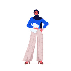 arab businesswoman leader in formal wear holding laptop successful business woman standing pose leadership