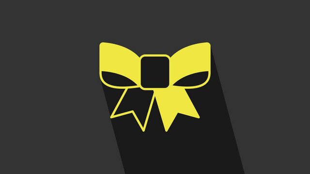 Yellow Gift bow icon isolated on grey background. 4K Video motion graphic animation