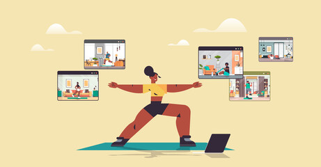 woman doing stretching exercises mix race people in web browser windows working out online training