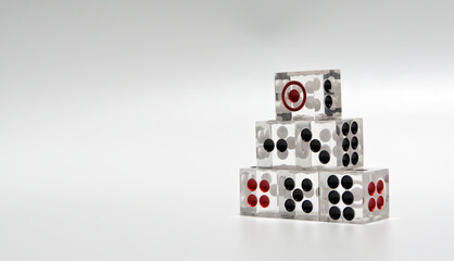 Six dice stacked at the right of image on a white background,Copyspace.