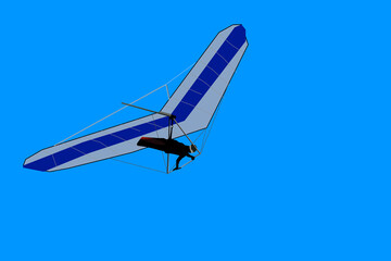 hang glider flying in the blue sky
