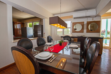 Interior design of luxury villa dining area with table