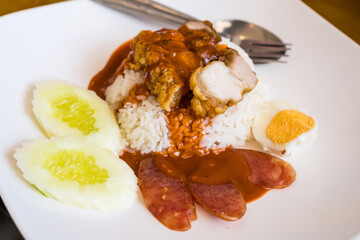 Crispy pork with rice, pork rice or rice topped with crispy pork and sauce