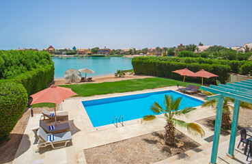 Swimming pool at at luxury tropical holiday villa resort