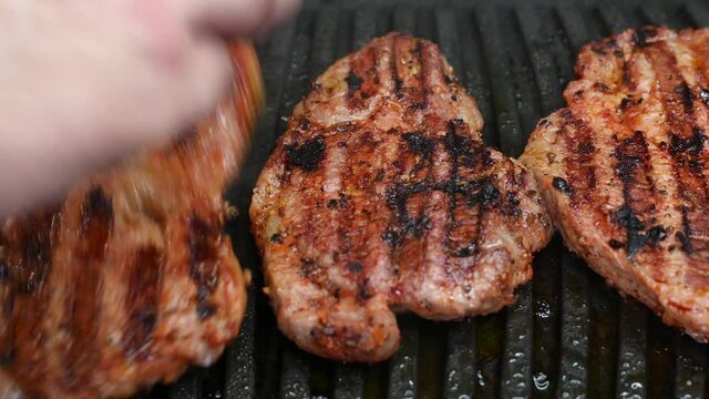  4k video flip grilled steaks, grilled meat