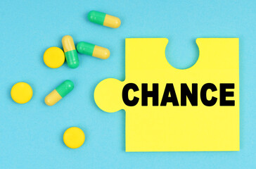 On a blue background, there are pills and a puzzle with the inscription - CHANCE