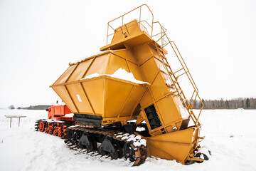 Caterpillar tractor DT-75B and mechanical peat collecting machine MTF-43.