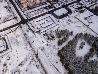 Obraz na płótnie Canvas Aerial photo from drone of winter small city in Ukraine. Winter city scape