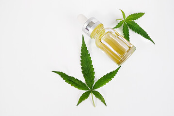 Cannabis oil and leaves isolate on white background.cannabis CBD oil herb products.