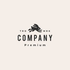 Obraz premium jumping running rabbit hare bunny hipster vintage logo vector icon illustration