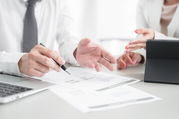 Business adviser meeting to analyze and discuss the situation on the financial report in the meeting room, Financial advisor and accounting concept