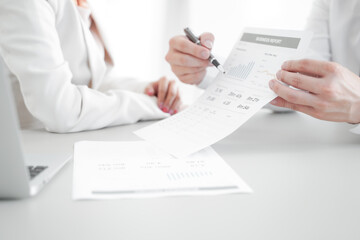 Business adviser meeting to analyze and discuss the situation on the financial report in the meeting room, Financial advisor and accounting concept