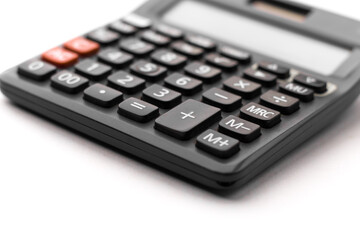 Obraz premium Black calculator on white background isolated stock image.