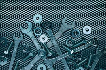 Set of chrome wrenches on steel surface. Mechanic tools for maintenance. Hardware tools to fix
