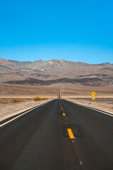 Empty infinite Road in the Desert in Death Valley, USA