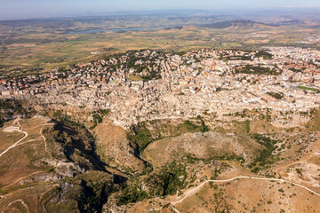 Fototapeta na wymiar Morning aerial view of Matera, the city of stones. a flight over a city full of history