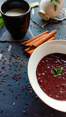 Photo of black glutinous rice porridge and coconut milk, photo of sweet food