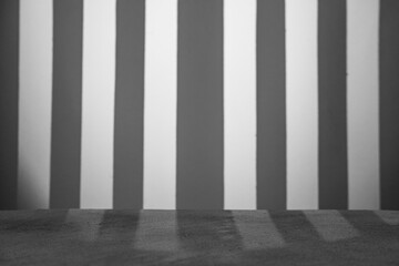 Grey background with catwalk and abstract blurred light stripes. Space for lettering, design, and presentation.