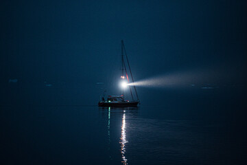 Boat light in the night - Powered by Adobe