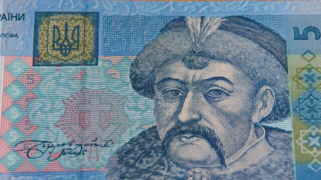 National currency of Ukraine hryvnia UAH. Face of hetman Bohdan Khmelnytsky on paper bill. Concept of investment, success, financial prospects or career advancement. Hryvna or hryvnya