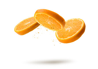 Orange fruit slices flying and dripping on white background - 438771767