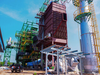 An electrostatic precipitator and stack in biomass power plant. - obrazy, fototapety, plakaty