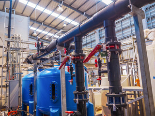 Tanks of chemical dosing in Combined-Cycle Co-Generation Power Plant.