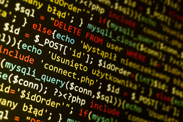 Obraz premium Software development pattern. Programmer monitor with php language code. Closeup tablet screen technology background