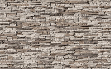 Texture wall stone sandstone with shadows and deep pattern. Clinker tiles or bricks on the wall in the form of wild stone