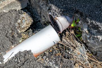 Broken pipes due to subsidence of building on a peatbog