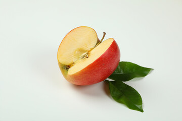 Ripe apple with leaves on white background