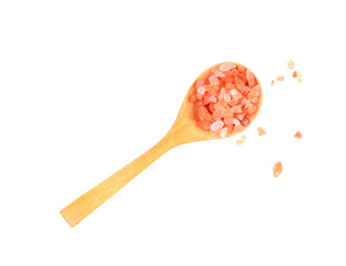 pink Himalayan rock-salt on a wooden spoon. Isolated on white.