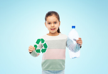 waste sorting and sustainability concept - smiling girl holding green recycling sign and plastic...