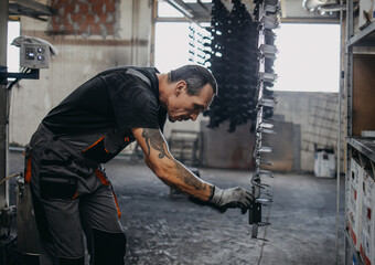 Manual worker welder on his job. People at heavy industry work. Industrial concept.