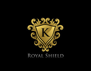 Luxury gold king shield letter K logo design, classic Golden floral badge design