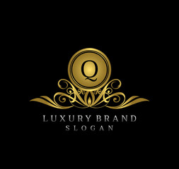 Fototapeta na wymiar Royal Queen Boutique Q Letter Logo Design, classic Golden floral badge design