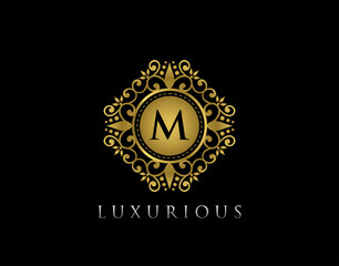 Luxury Gold Bagde M Letter Logo. Golden floral badge design  for Royalty, Letter Stamp, Boutique,  Hotel, Heraldic, Jewelry, Wedding.