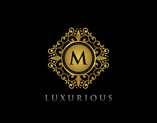 Luxury Gold Bagde M Letter Logo. Golden floral badge design  for Royalty, Letter Stamp, Boutique,  Hotel, Heraldic, Jewelry, Wedding.