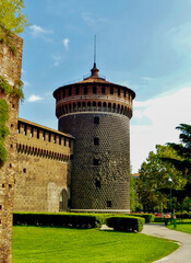 Fototapeta na wymiar Sforza Castle - Castello Sforzesco, view from Parco Sempione - Sempione Park, Milan, Italy