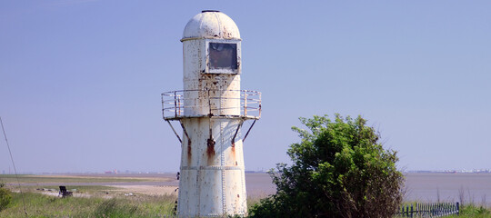 river humber light house, Paull light house, east yorkshire coast, lighthouse is a tower, building,  emit light from a system of lamps and lenses and to serve as a navigational aid to shipping
