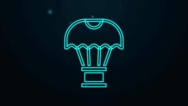 Glowing neon line Box flying on parachute icon isolated on black background. Parcel with parachute for shipping. Delivery service, air shipping. 4K Video motion graphic animation