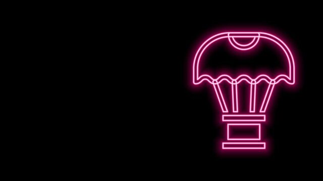 Glowing neon line Box flying on parachute icon isolated on black background. Parcel with parachute for shipping. Delivery service, air shipping. 4K Video motion graphic animation