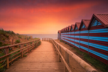 Fototapeta premium Beautiful way to the beach at sunset in summer in La Arena beach in Muskiz